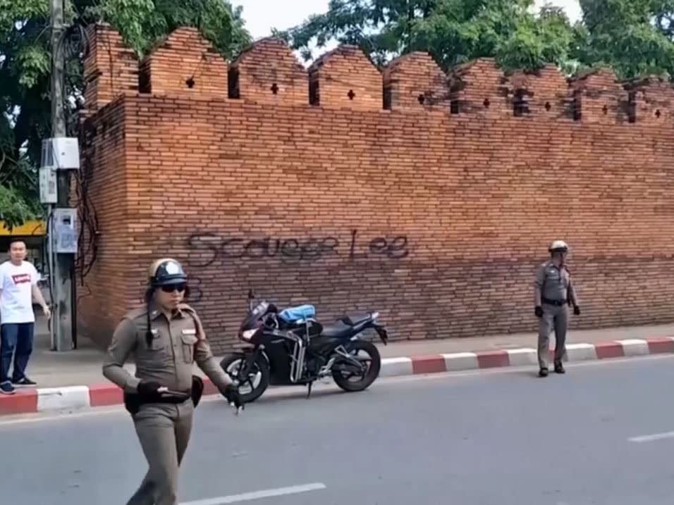 British tourist spared jail in Thailand after spraying 'Scouser Lee' on ancient gate