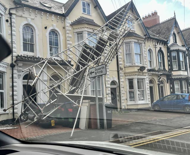 Collapsed scaffolding in front of a building