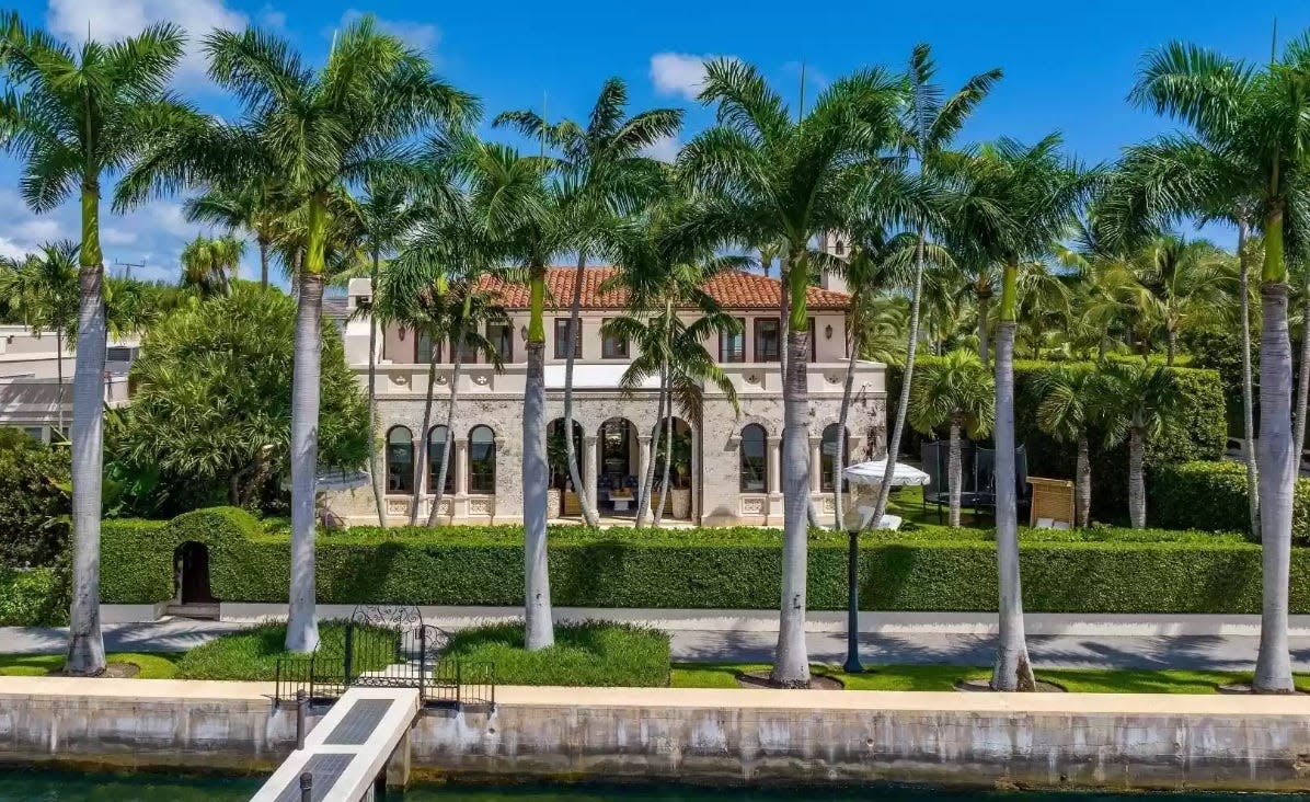 Just relisted for $35.9 million by Tommy and Dee Hilfiger, a house facing the Intracoastal Watreway at 313 Dunbar Road in Palm Beach has Mediterranean-style architecture.