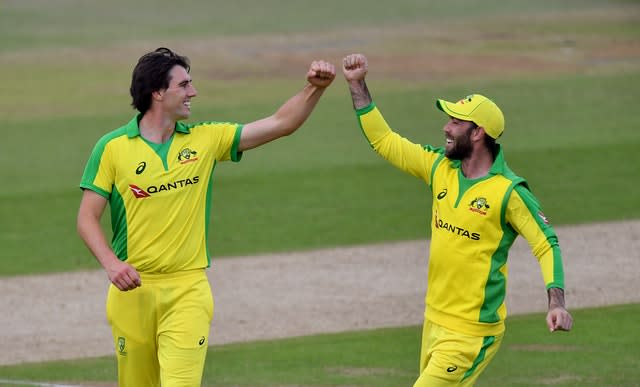 Australia’s Pat Cummins celebrates with Glenn Maxwell (right) after taking the wicket of England’s Jonny Bairstow