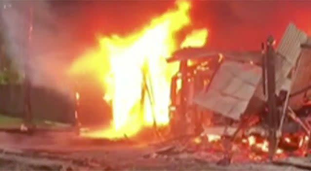 Desperate onlookers pleaded with the occupant, and local postman named Merv, to come outside and abandon his generations-old home. Source: 7 News