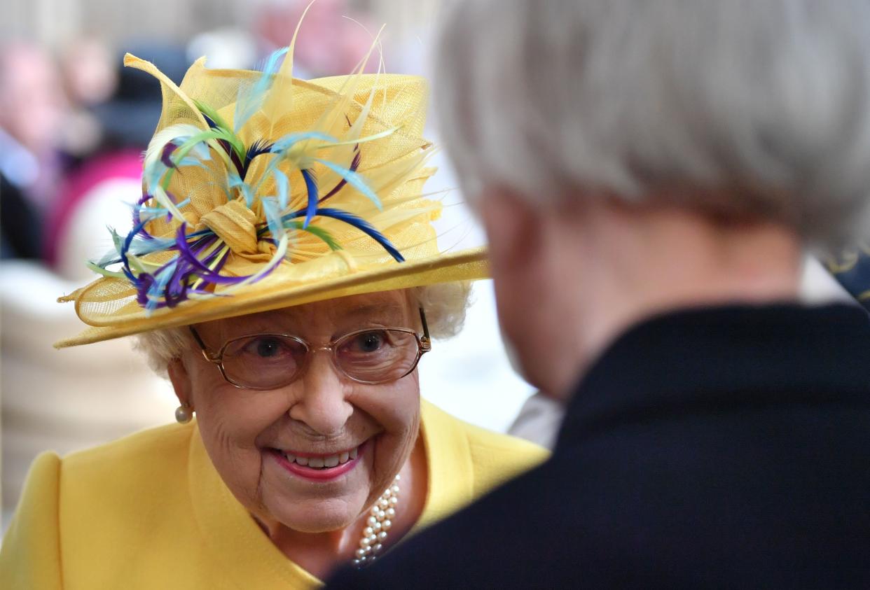 Britain's Queen Elizabeth II takes part in the Royal Maundy Service at St George's Chapel in Windsor, west of London on April 18, 2019. - Maundy Thursday is the Christian holy day falling on the Thursday before Easter. The Queen commemorates Maundy by offering 'alms' to senior citizens - retired pensioners recommended by clergy and ministers of all denominations, in recognition of service to the Church and to the local Community. Each recipient receives two purses, one red and one white. (Photo by ARTHUR EDWARDS / POOL / AFP)        (Photo credit should read ARTHUR EDWARDS/AFP/Getty Images)