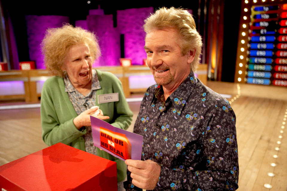 Catherine Tate and Noel Edmonds take part in a special episode of Deal or No Deal for Red Nose Day on March 16, 2007. (Photo by Paul Groom/Comic Relief/Getty Images)