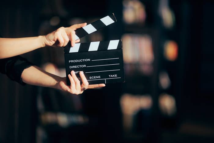 Someone holding a clapperboard