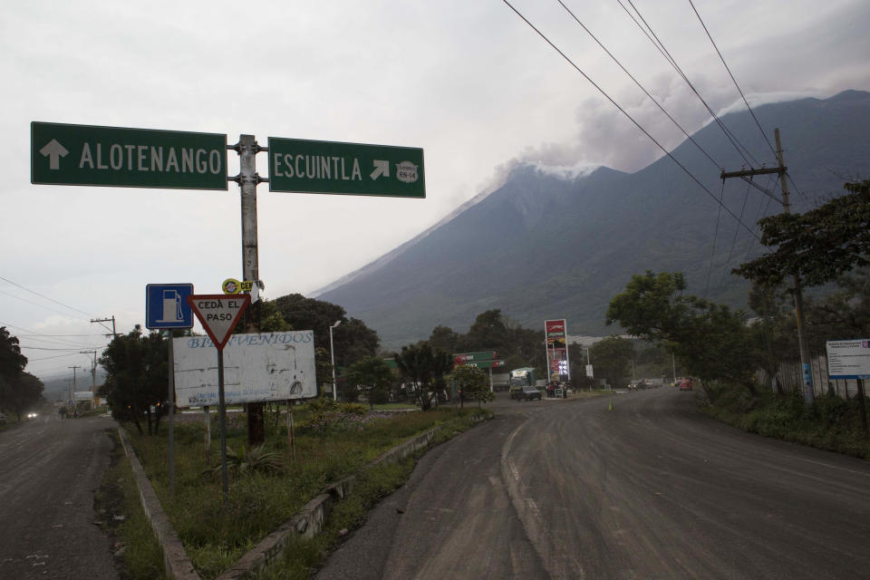 <p>Volcan de Fuego, or Volcano of Fire, blows outs a thick cloud of ash, as seen from Alotenango, Guatemala, June 3, 2018. (Photo: Luis Soto/AP) </p>