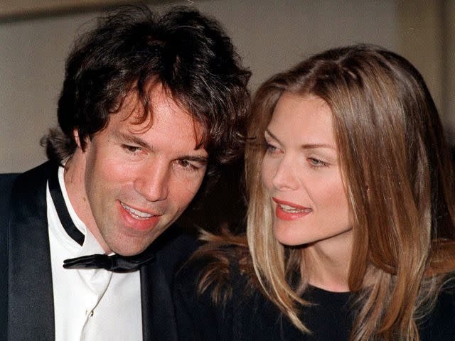 Kypros/Getty Michelle Pfeiffer with her husband, producer David E. Kelley, circa 1995.