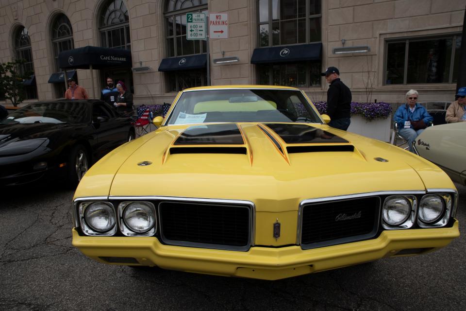 A 1970 Oldsmobile Cutlass Rallye 350 is shown off by David Gerald at the Back To The Bricks car show in South Bend on June 12, 2023.