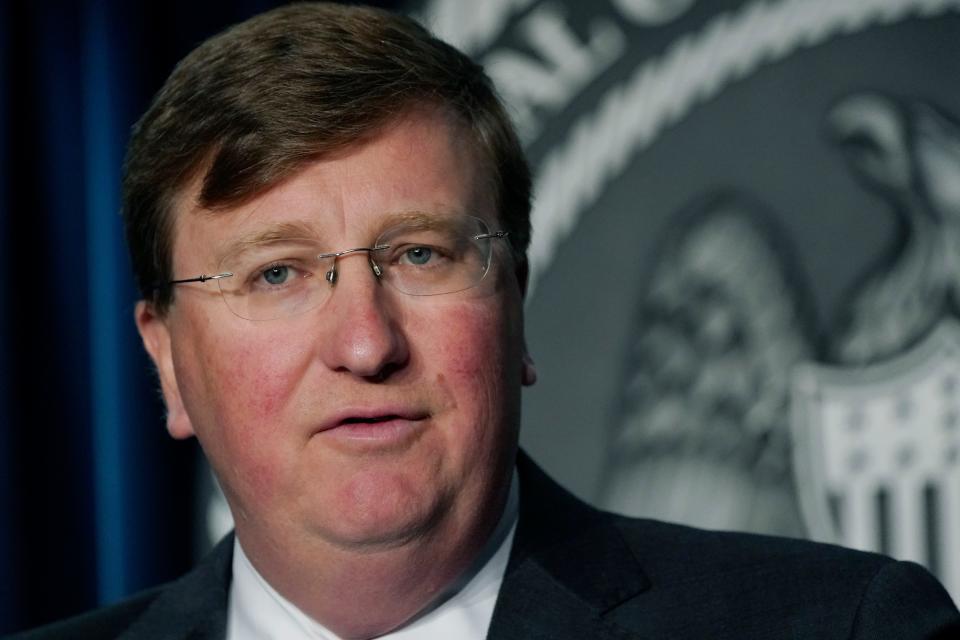 Gov. Tate Reeves responds to a reporter's question during a news briefing regarding Mississippi's COVID-19 response in Jackson, Miss., Thursday, Aug. 19, 2021.