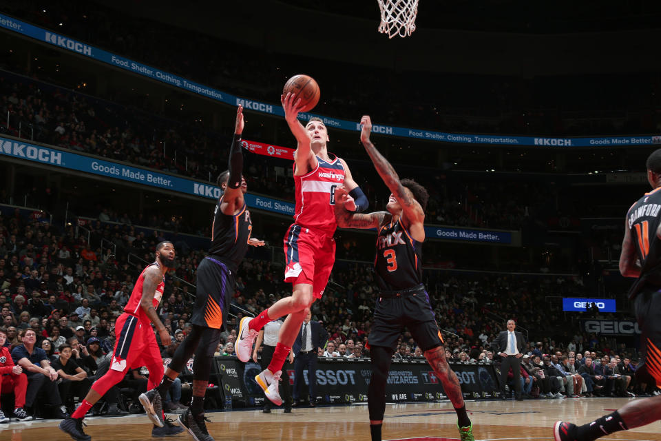 The Washington Wizards outlasted the Phoenix Suns on Saturday to win in triple overtime. (Ned Dishman/Getty Images)