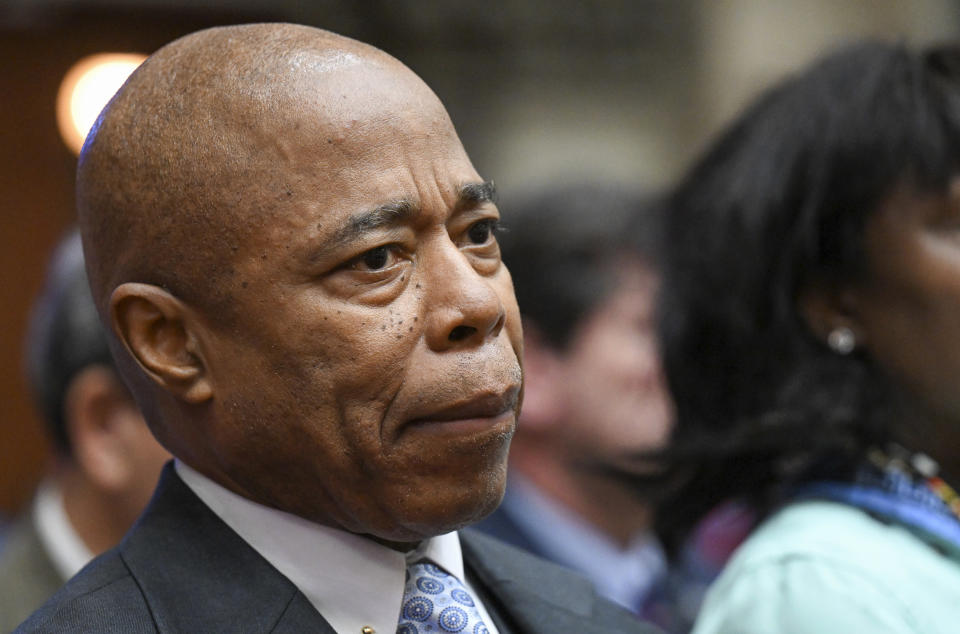 FILE - New York City Mayor Eric Adams listens to Gov. Kathy Hochul deliver her State of the State address in the Assembly Chamber at the state Capitol on Jan. 10, 2023, in Albany, N.Y. Adams said Wednesday, May 10, 2023, that the death of Jordan Neely at the hands of a fellow subway rider was “a tragedy that never should have happened” and pledged to do more to help people experiencing mental health crises. (AP Photo/Hans Pennink, File)