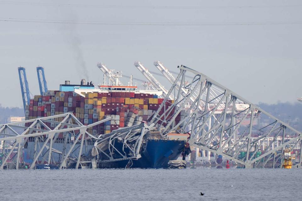 <p>AP Photo/Mark Schiefelbein</p> The Francis Scott Key Bridge following its collapse on March 26, 2024