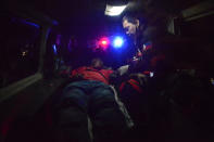 <p>A Filipino rescuer attends to a wounded hotel guest outside the Resort World Manila hotel in Pasay city, south of Manila, Philippines, June 2, 2017. (Photo: Ezra Acayan/EPA) </p>