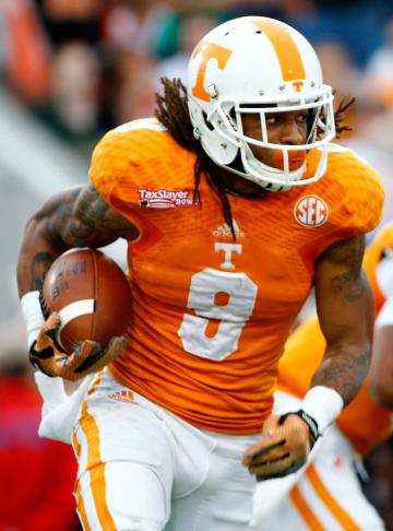 JACKSONVILLE, FL - JANUARY 02:  Von Pearson #9 of the Tennessee Volunteers rushes for yardage during the TaxSlayer Bowl against the Iowa Hawkeyes at EverBank Field on January 2, 2015 in Jacksonville, Florida.  (Photo by Sam Greenwood/Getty Images)