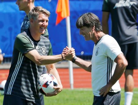 Football Soccer - Euro 2016 - Germany Training - Stade Camille Fournier, Evian-Les-Bains, France - 27/6/16 - Germany's Bastian Schweinsteiger and coach Joachim Loew during training. REUTERS/Denis Balibouse