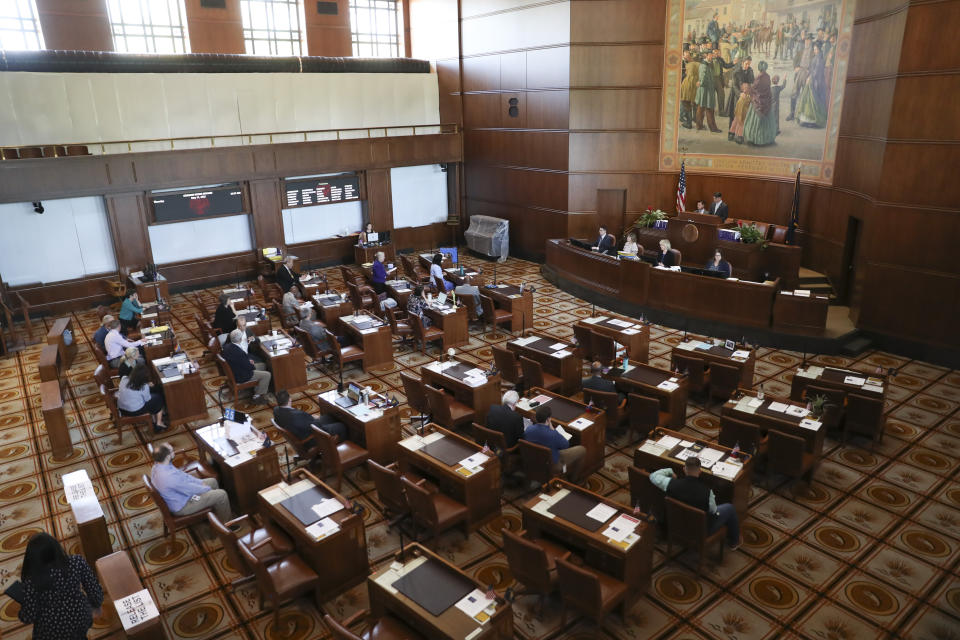 FILE - The state senate convenes at the Oregon State Capitol in Salem, Ore., Thursday, May 11, 2023. Republican state senators in Oregon who walked out of the Legislature earlier this year have filed a federal lawsuit as part of their efforts to seek reelection. The three senators filed the lawsuit Monday, Nov. 6, 2023. (AP Photo/Amanda Loman, File)