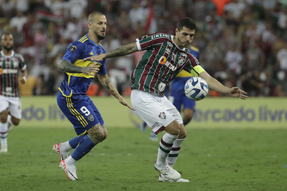 Nino of Brazil's Fluminense, right, and Dario Benedetto of Argentina's Boca Juniors battle for the ball during a Copa Libertadores final soccer match at Maracana stadium in Rio de Janeiro, Brazil, Saturday, Nov. 4, 2023. (AP Photo/Bruna Prado)