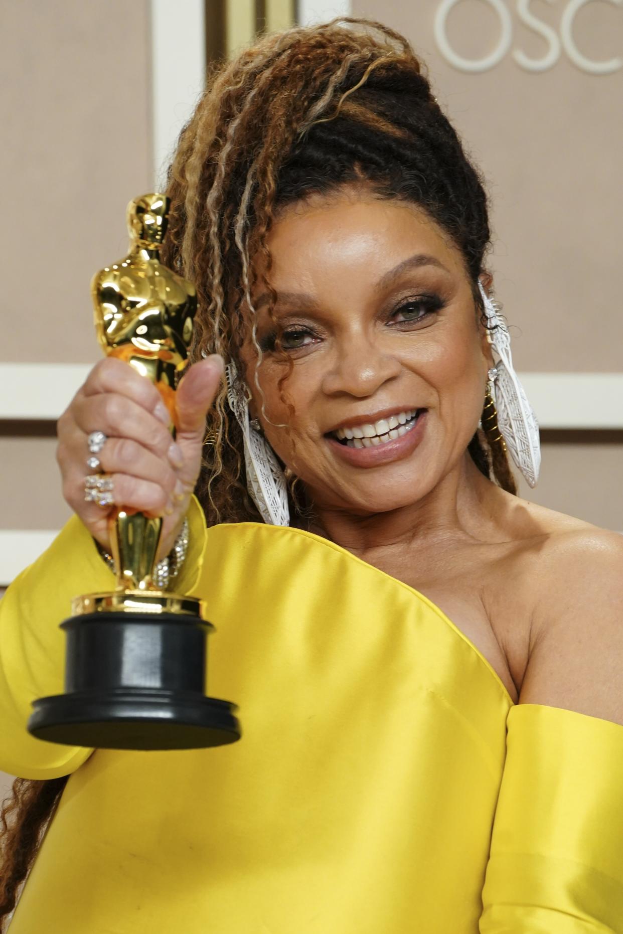 Ruth E. Carter poses with the award for best costume design for "Black Panther: Wakanda Forever" in the press room at the Oscars on Sunday, March 12, 2023, at the Dolby Theatre in Los Angeles. (Photo by Jordan Strauss/Invision/AP)