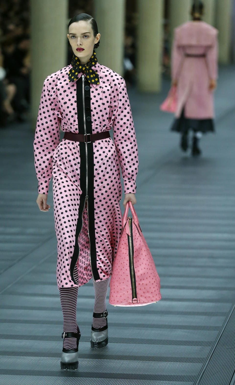 A model presents a creation for Miu Miu's Ready to Wear's Fall-Winter 2013-2014 fashion collection, presented, Wednesday, March 6, 2013 in Paris. (AP Photo/Jacques Brinon)