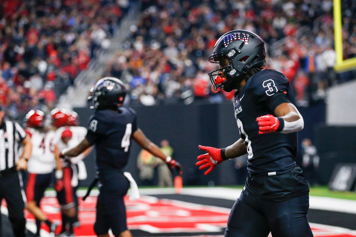 UNLV wide receiver Zyell Griffin (3) reacts after his touchdown against San Diego State during the first half of an NCAA college football game Friday, Nov. 19, 2021, in Las Vegas. (AP Photo/Chase Stevens)