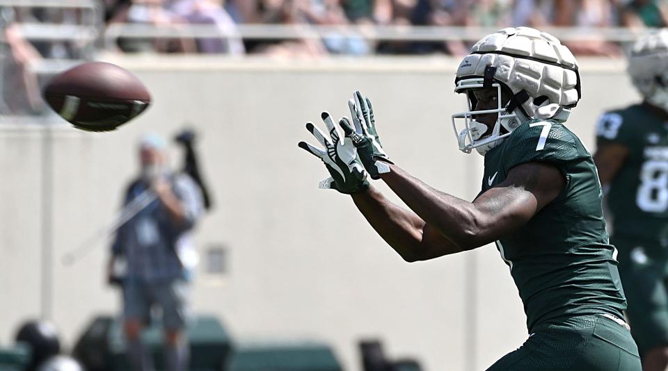 Apr 15, 2023; East Lansing, MI, USA;  Michigan State Spartans wide receiver Antonio Gates Jr. (7) catches a pass at Spartan Stadium.