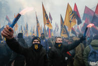 <p>Members of different nationalist parties burns flares and wave flags during the so-called ‘March of National Pride’ in downtown Kiev, Ukraine, Feb. 22, 2017. (Photo: SERGEY DOLZHENKO </p>