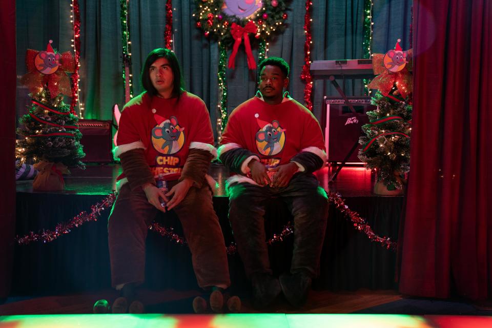 Andrew (Eduardo Franco, left) and Hags (Dexter Darden) prepare for one crazy Christmas Eve in the holiday comedy sequel "It's a Wonderful Binge."