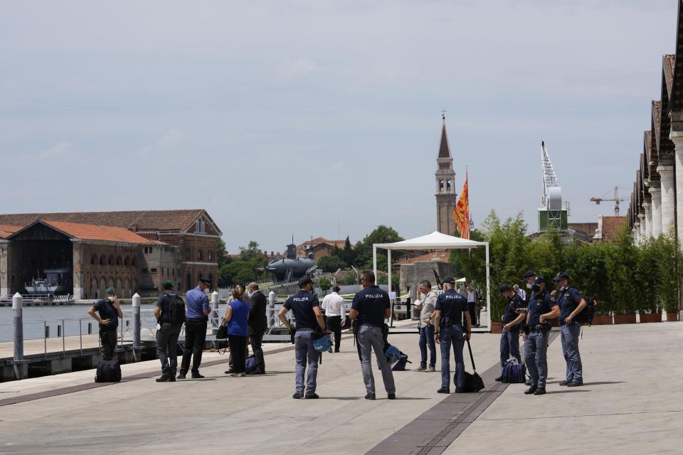 Policemen patrol the Arsenale, during a G20 meeting of Economy and Finance ministers and Central bank governors in Venice, Italy, Thursday, July 8, 2021. (AP Photo/Luca Bruno)
