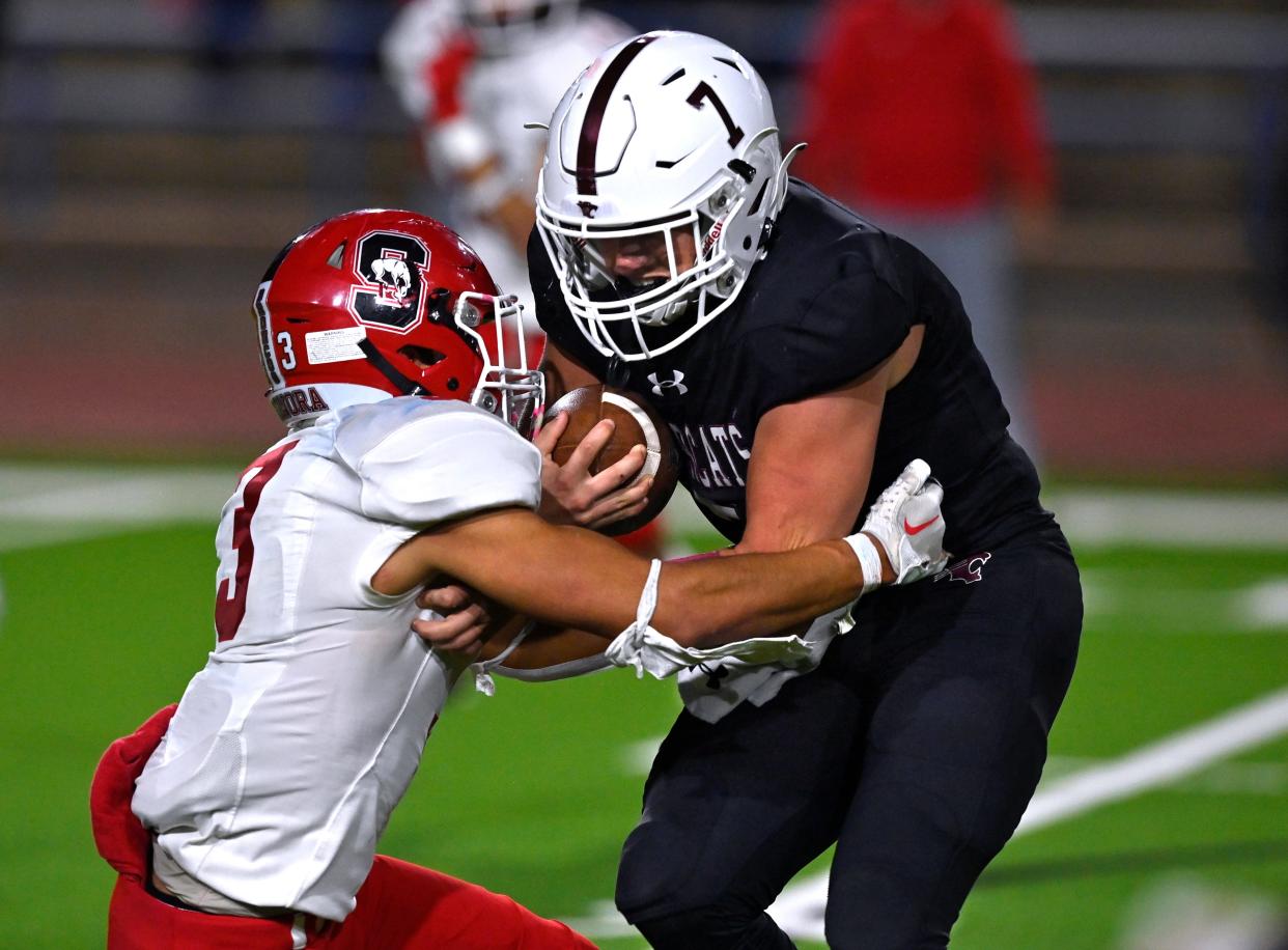 Hawley quarterback Keagan Ables is tackled by Sonora defensive back Juan Castillo during the Region 1-2A Div. 1 semifinal game Friday in San Angelo.