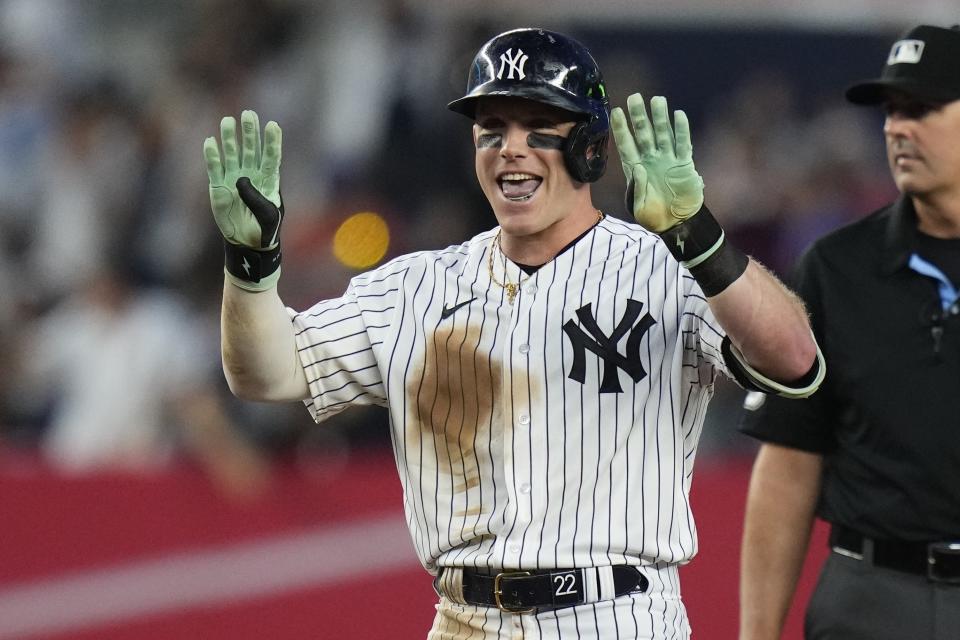 FILE - New York Yankees' Harrison Bader gestures to teammates after he advances to second base on a throwing error by New York Mets' Mark Vientos during the fourth inning of a baseball game Wednesday, July 26, 2023, in New York. Center fielder Harrison Bader and the New York Mets have agreed to a one-year contract for about $10 million, according to a person familiar with the deal. The person spoke to The Associated Press on condition of anonymity Thursday, Jan. 4, 2024, because the move was pending a physical and had not been announced by the team. (AP Photo/Frank Franklin II)