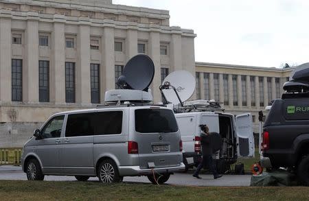 Television vans are pictured ahead of the start of Syrian talks in front of the United Nations European headquarters in Geneva, Switzerland, January 29, 2016. REUTERS/Denis Balibouse