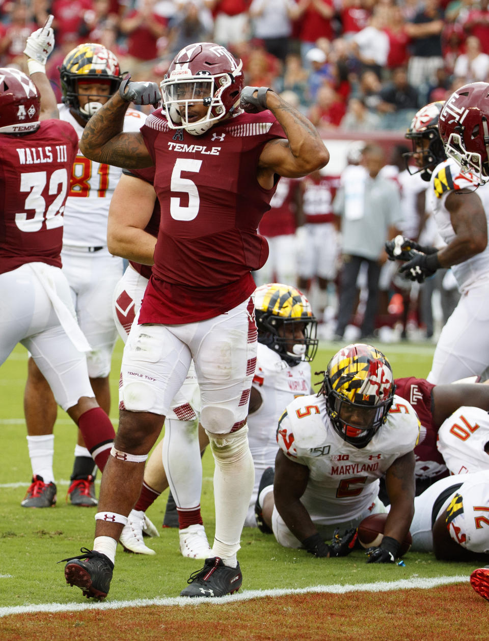 Temple linebacker Shaun Bradley (5) reacts to the defensive goal line stop of Maryland running back Anthony McFarland Jr. (5) during the second half of an NCAA college football, Saturday, Sept. 14, 2019, in Philadelphia. Temple won 20-17. (AP Photo/Chris Szagola)