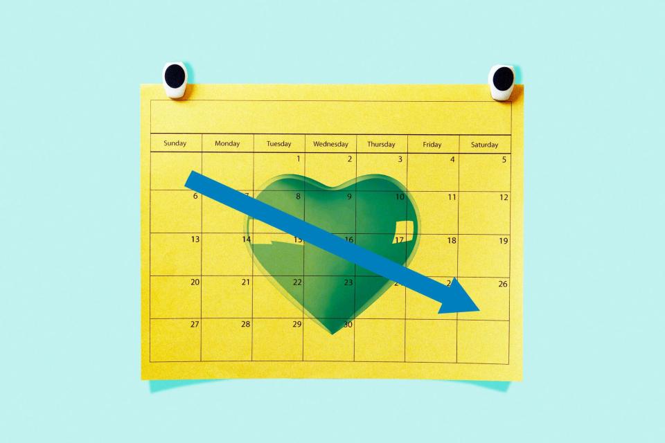 A calendar with a heart and a downward arrow