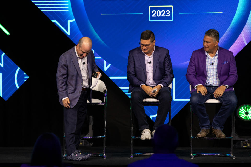 Left to right: Aptos general manager, Americas, Jeremy Grunzweig, Doug Goehl, Crocs VP of global enterprise applications, and Todd Steiner, chief information officer for JD Sports.