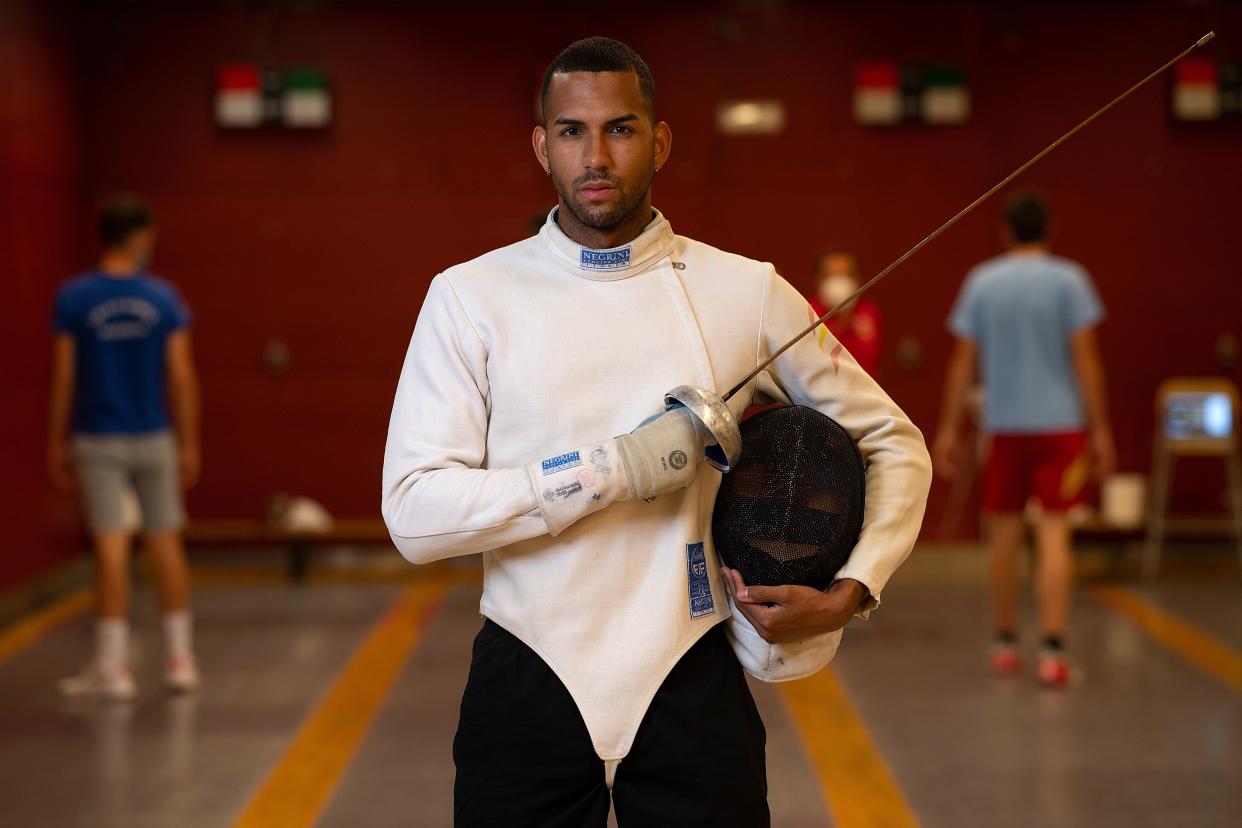 Spanish fencer Yulen Pereira poses during an AFP photo session while training at the Centre of High Performance of the High Council of Sports in Madrid on June 19, 2020. - The International Olympic Committee announced in March the 2020 Olympic Games would be delayed due to the coronavirus pandemic that has killed hundreds of thousands and brought international travel to a virtual halt. The Games are now due to open on July 23, 2021, but organisers face the unprecedented headache of rearranging the event, which requires a costly rejigging of everything from venues to transport. (Photo by PIERRE-PHILIPPE MARCOU / AFP) (Photo by PIERRE-PHILIPPE MARCOU/AFP via Getty Images)