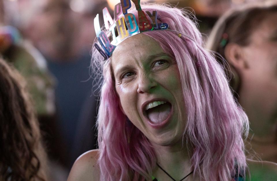 A fan dances during the Phish concert, Friday, June 3, 2022, at Ruoff Music Center in Noblesville, Ind. 
