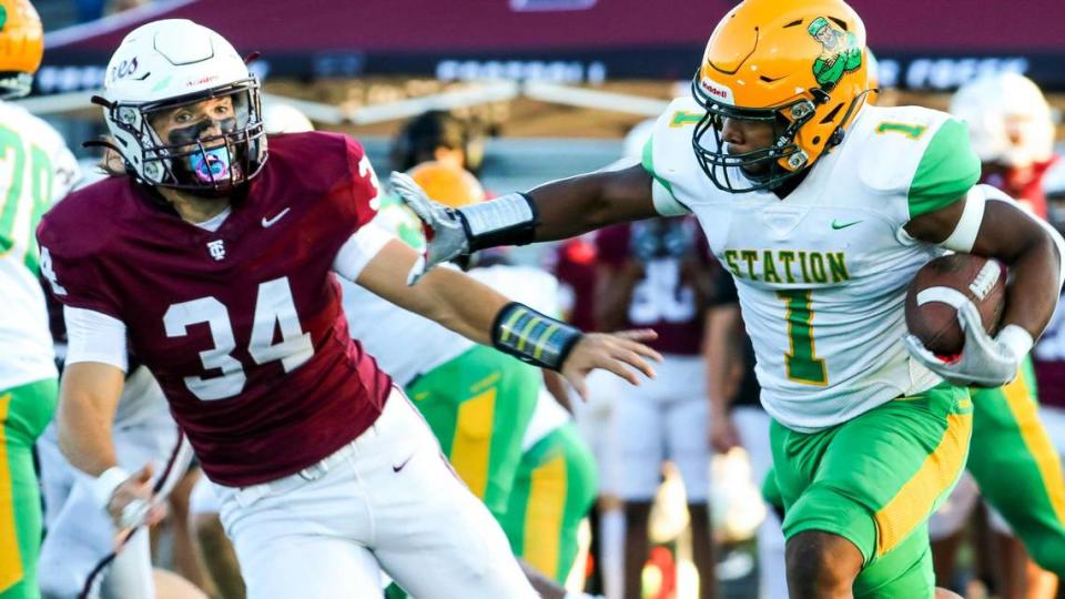 Tates Creek’s Logan Julian (34) tried to bring down Bryan Station’s Kalen “Jaws” Washington during their regular season game at Tates Creek on Sept. 23. Bryan Station took advantage of several Commodores mistakes to win 41-0.