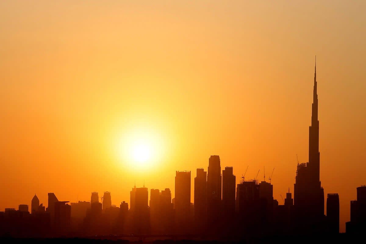 The skyline of downtown Dubai with Burj Khalifa at sunset  (AFP/Getty)