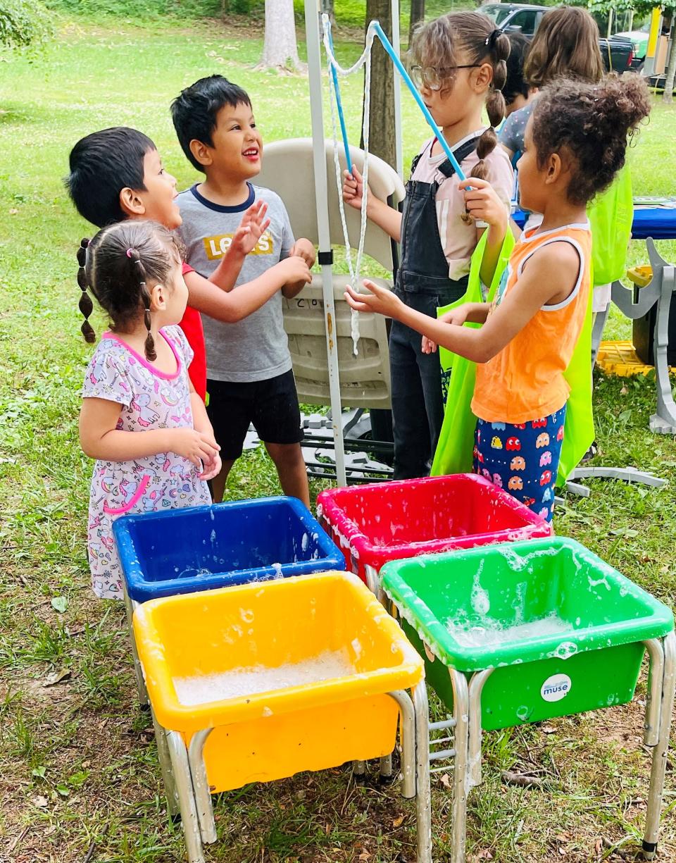 Bubble blowing station at the Kid A’Riffic Fun in the Park at Fountain City Park on June 7, 2023.