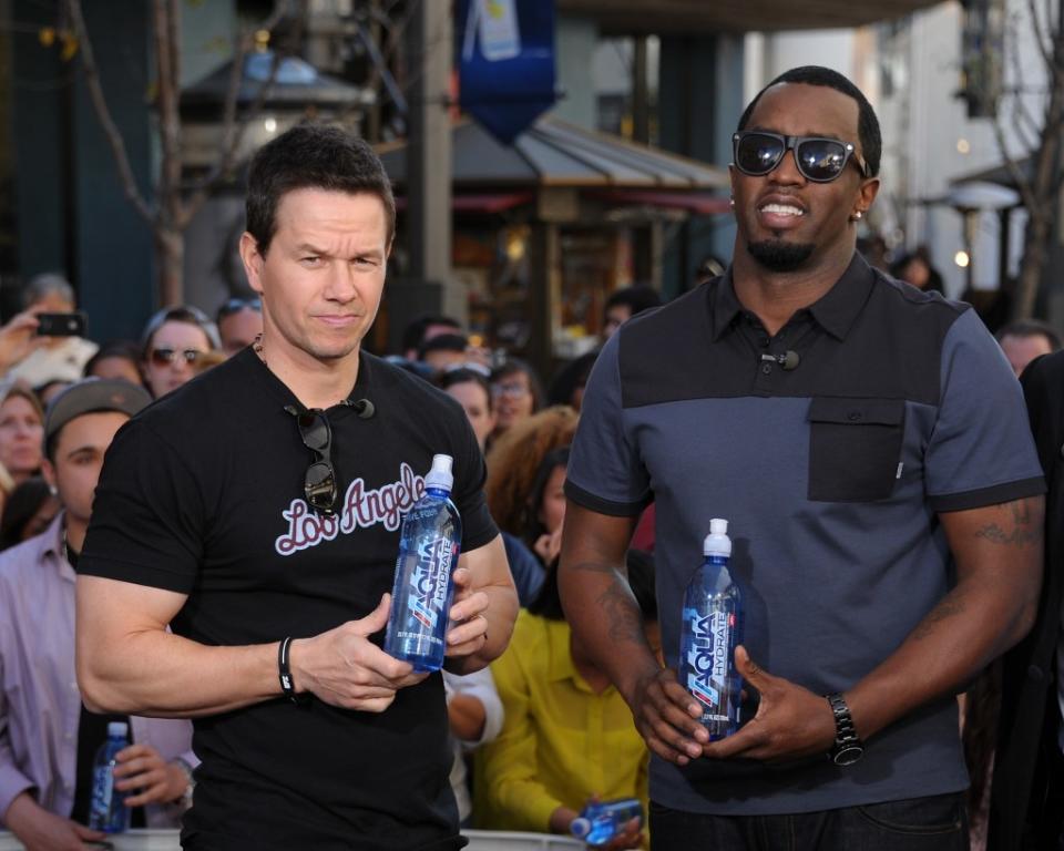 Burkle and Diddy were in a three-way deal with Mark Wahlberg after buying AquaHydrate and pushing it energetically. Getty Images for Extra