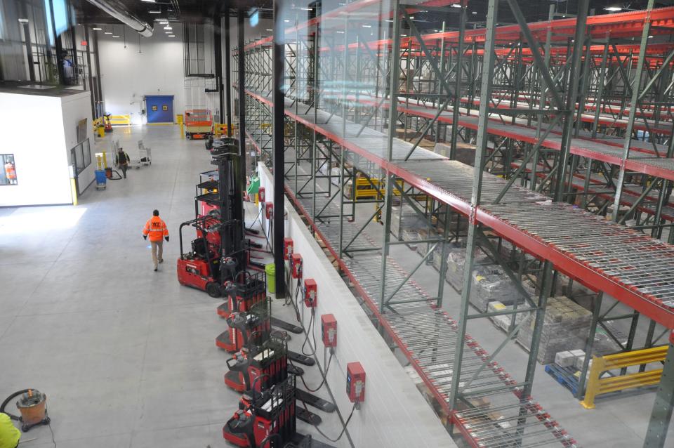 The warehouse in the new Food Bank of Delaware facility in Milford, as seen from the warehouse logistics classroom where students learn job skills.