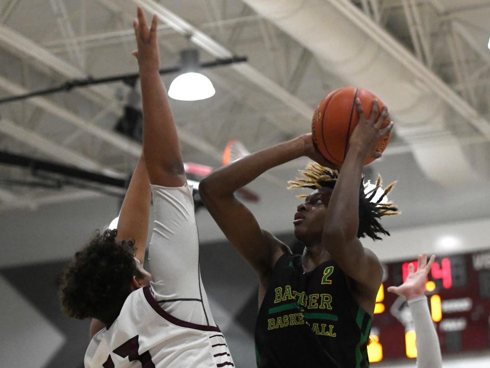 Bishop's Donny Thomas shoots the ball against London, Friday, Jan. 14, 2022, at London High School. Bishop won, 72-62.