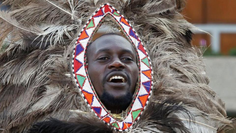 A delegate from the indigenous Maasai community wearing ostrich feathers, 6 September