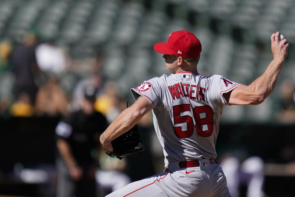 Los Angeles Angels' Nash Walters pitches against the Oakland Athletics during the sixth inning of a baseball game in Oakland, Calif., Wednesday, Oct. 5, 2022. (AP Photo/Godofredo A. Vásquez)