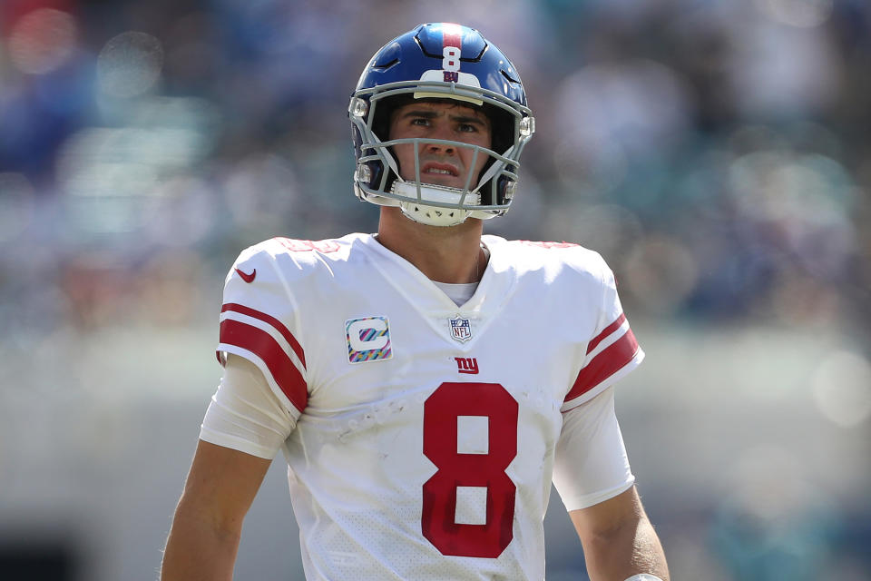 JACKSONVILLE, FLORIDA - OCTOBER 23: Daniel Jones #8 of the New York Giants looks on during the first half against the Jacksonville Jaguars at TIAA Bank Field on October 23, 2022 in Jacksonville, Florida. (Photo by Courtney Culbreath/Getty Images)