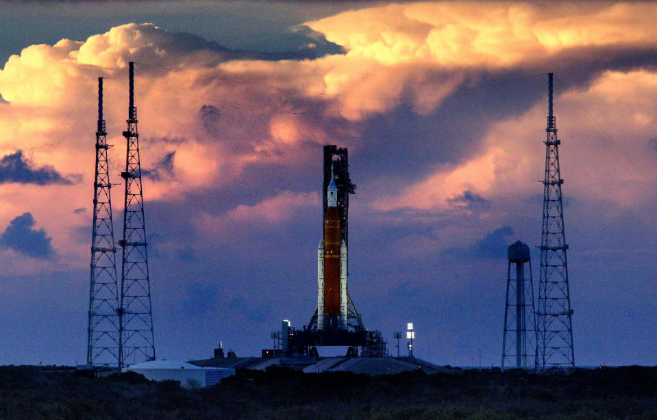 The sun sets over Artemis I, NASA's heavy-lift lunar rocket system, on Sept. 3, 2022, at Kennedy Space Center, Florida. (Joe Burbank/Orlando Sentinel/Tribune News Service via Getty Images)