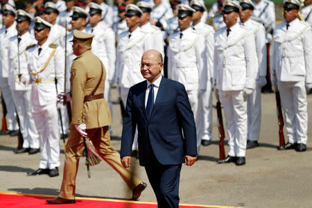 Barham Salih, Iraq's newly elected President walks during a handover ceremony at Salam Palace in Baghdad, Iraq October 3, 2018. REUTERS/Thaier Al-Sudani