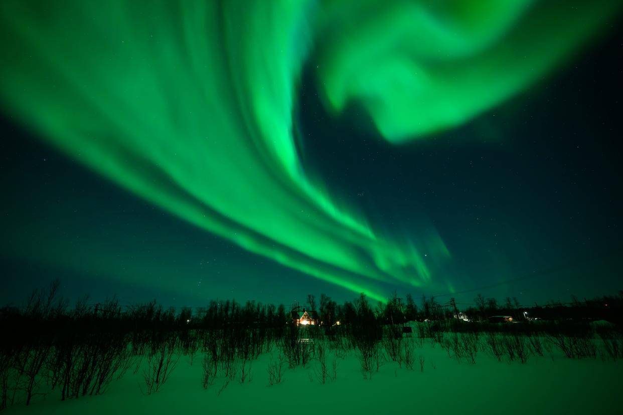 The aurora borealis is seen in March in the sky above Kiruna, Sweden.