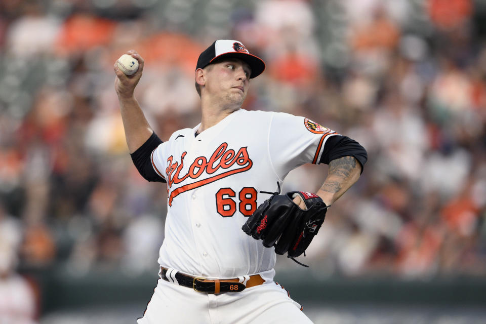 Baltimore Orioles starting pitcher Tyler Wells throws during the second inning of a baseball game against the Los Angeles Dodgers, Tuesday, July 18, 2023, in Baltimore. (AP Photo/Nick Wass)