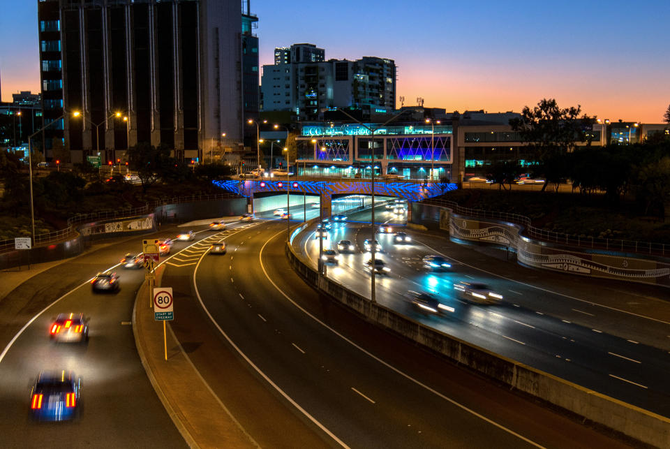 The Graham Farmer Freeway Tunnel is seen beaming blue lights. Source: Mains Road WA