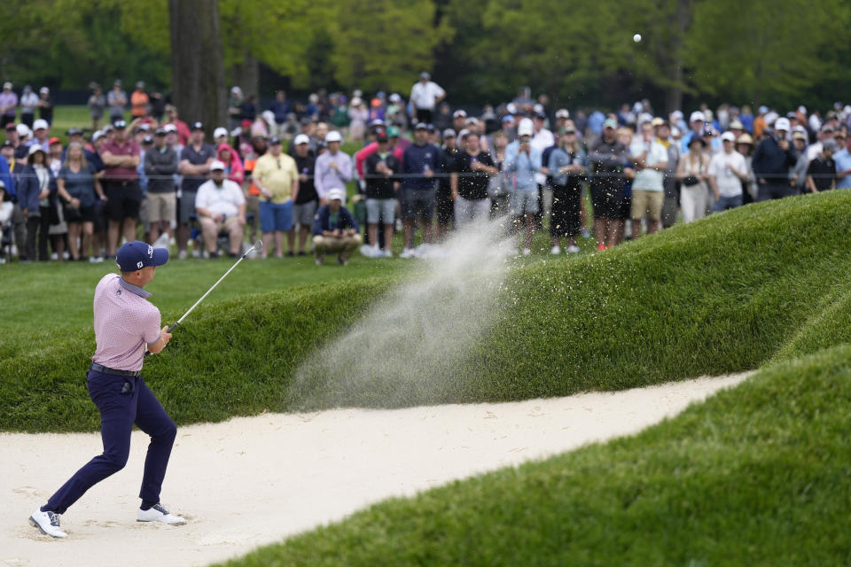 Justin Thomas hits from the bunker on the fifth hole during the second round of the PGA Championship golf tournament at Oak Hill Country Club on Friday, May 19, 2023, in Pittsford, N.Y. (AP Photo/Seth Wenig)